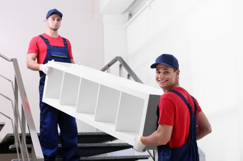 Professional mover assisting with loading items