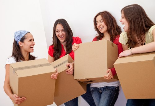 Professional removal truck loading in Storage Merton