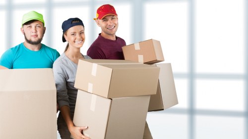 Satisfied customer accessing their storage unit in Merton