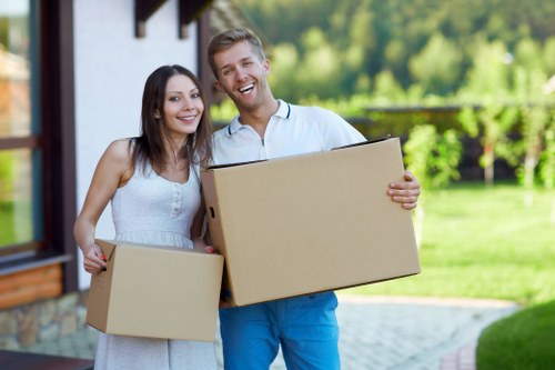 Experienced movers assisting with loading trucks
